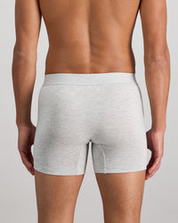 Model wears Bamboo Mens Trunk in GREY MARLE. On body back view