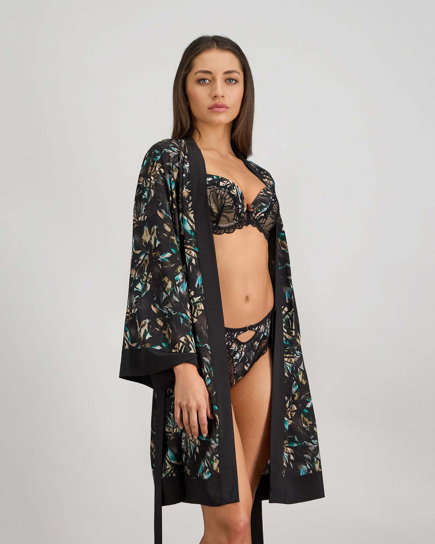 Model wears Lost Paradise Robe in BLACK PRINT. On body side view