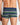 Model wears Rugby Stripe Mens Trunk in FOLIAGE GREEN/MEDEIVAL BLUE/MARLE. On body back view