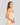 Model wears Simply Seamless Camisole in Nude. On body side view