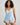 Model wears Sweet Indulgence Cami & Short Set in SKYWAY/WHITE. On body front view