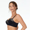 Model wears Castaspell Contour Long Line Bra in BLACK. On body side view
