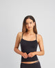 Model wears Simply Seamless Camisole in BLACK. On body front view