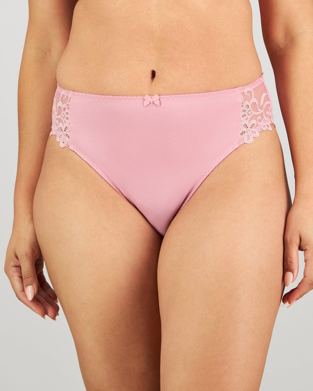 Model wears Coral High Cut Brief in LILAS. On body front view