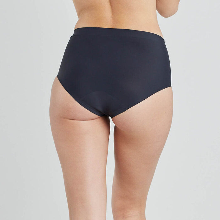 Model wears Flo Light Full Brief in BLACK. On body back view