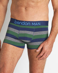 Model wears Rugby Stripe Mens Trunk in FOLIAGE GREEN/MEDEIVAL BLUE/MARLE. On body front view