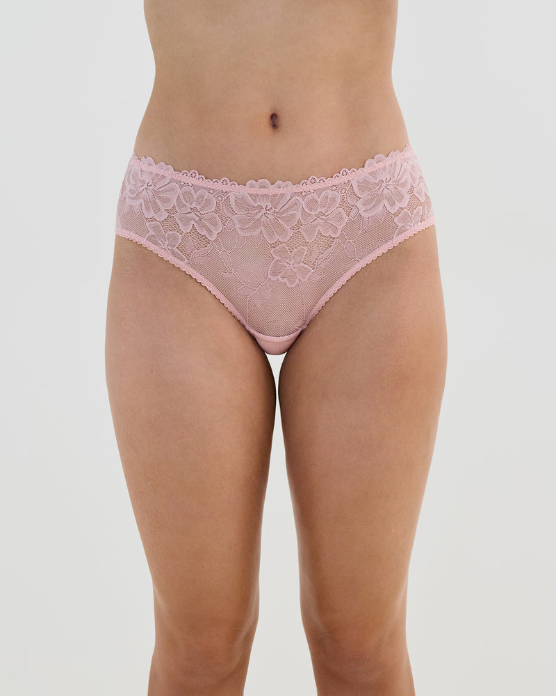 Model wears Lacey Brazilian in SILVER PINK. On body front view