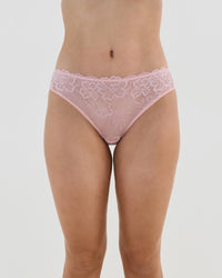 Model wears Lacey Bikini in SILVER PINK. On body front view