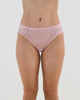 Model wears Lacey Bikini in SILVER PINK. On body front view