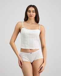 Model wears Body Cocoon Camisole in WHITE. On body front view