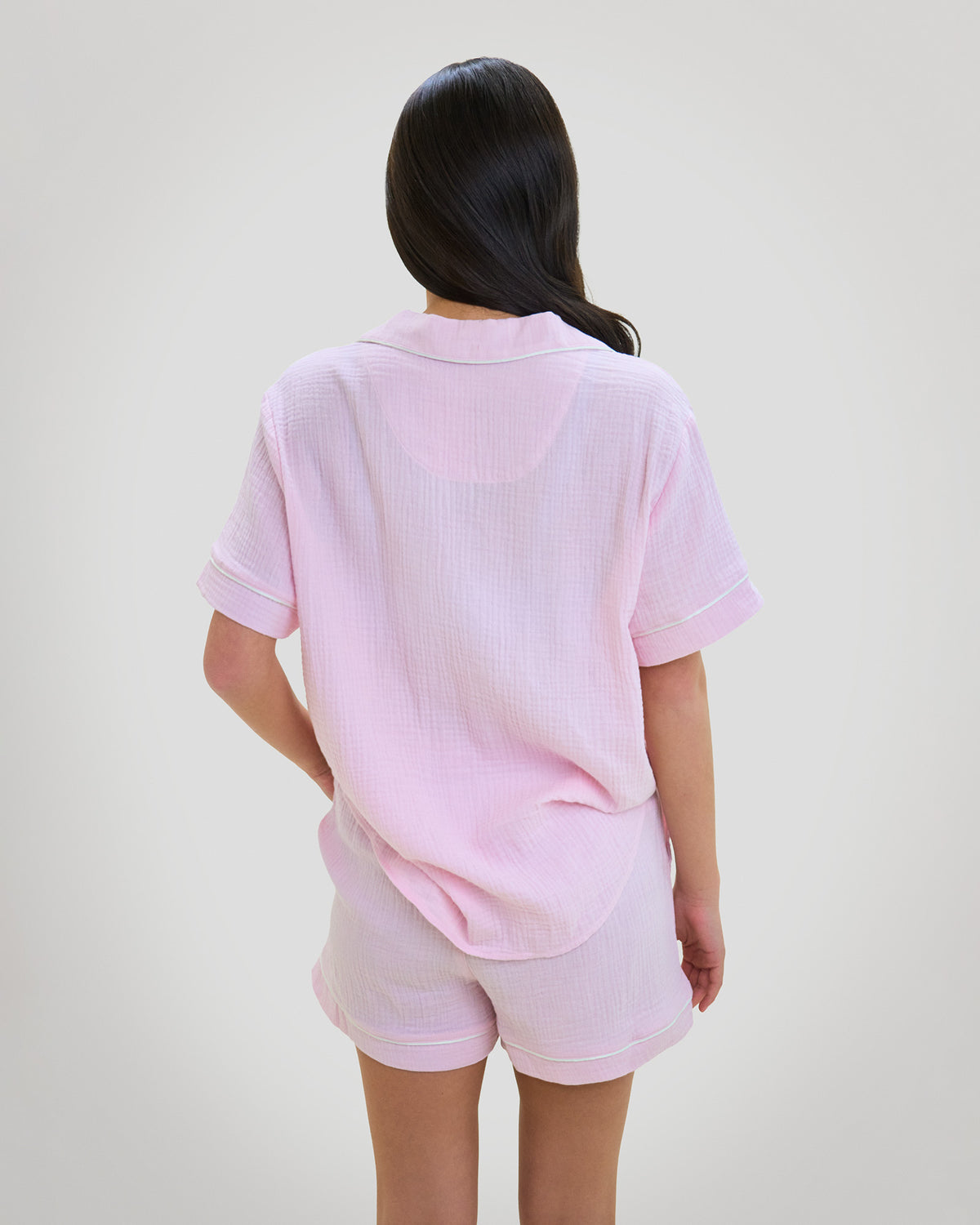 Model wears Bonbon Short Pj in PALE LILAC. On body back view