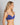 Model wears Simply Seamless Contour Bra in NAVY BLUE. On body side view