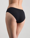 Model wears Body Cotton Bikini in BLACK. On body back view