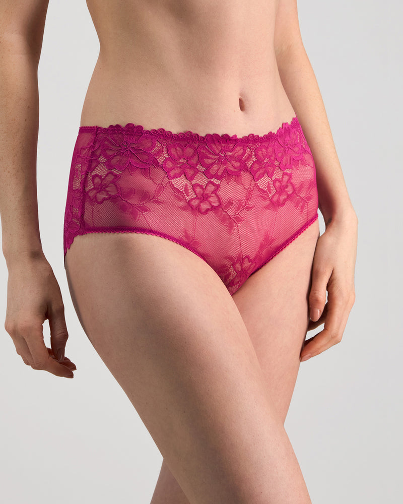 Model wears All Lacey Full Brief in FANTASY FUCHSIA. On body side view