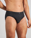 Model wears Cotton Stretch Mens Brief in BLACK PINSTRIPE. On body side view
