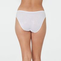 Model wears Body Lace High Cut Brief in WHITE. On body back view