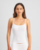 Model wears Simply Seamless Camisole in WHITE. On body front view