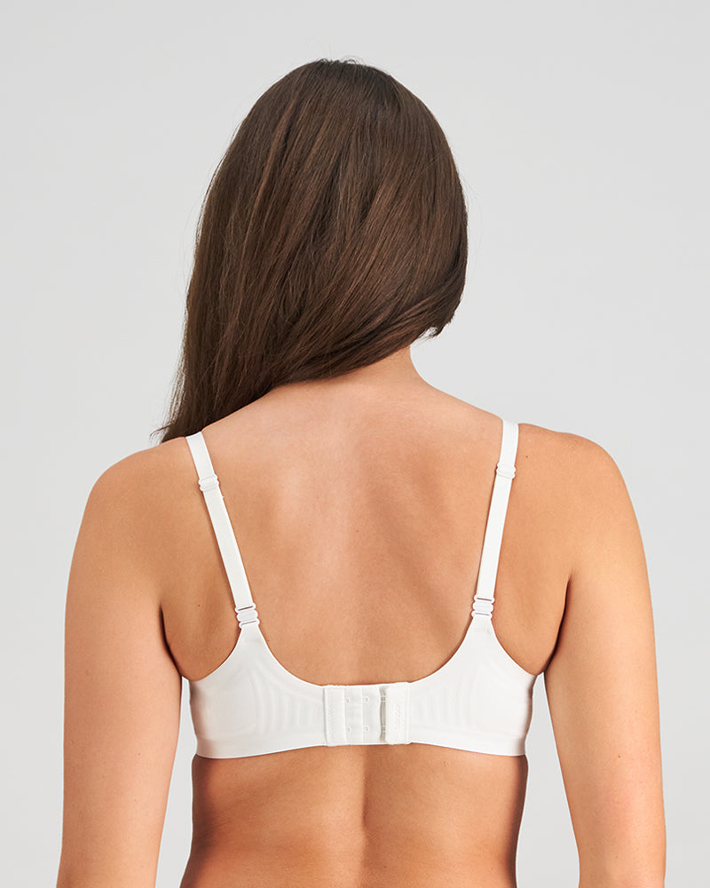 Model wears Comfit Collection Contour Bra in WHITE. On body back view