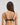 Model wears Lost Paradise Push Up Bra in BLACK PRINT. On body back view