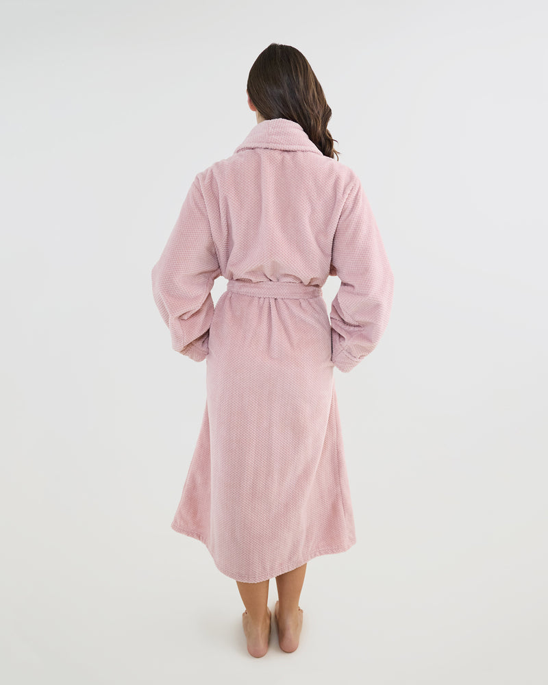 Model wears Cardrona Robe in PALE MAUVE. On body back view