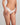 Model wears Morning Lola Midi in WHITE. On body side view
