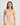 Model wears Simply Seamless Camisole in Nude. On body front view