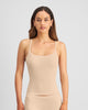 Model wears Simply Seamless Camisole in Nude. On body front view