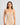 Model wears Simply Seamless Camisole in Nude. On body front view