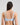 Model wears Coral Underwire Bra in SKYWAY. On body back view