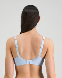 Model wears Coral Underwire Bra in SKYWAY. On body back view