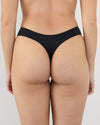 Model wears Au Naturel Thong in BLACK. On body back view