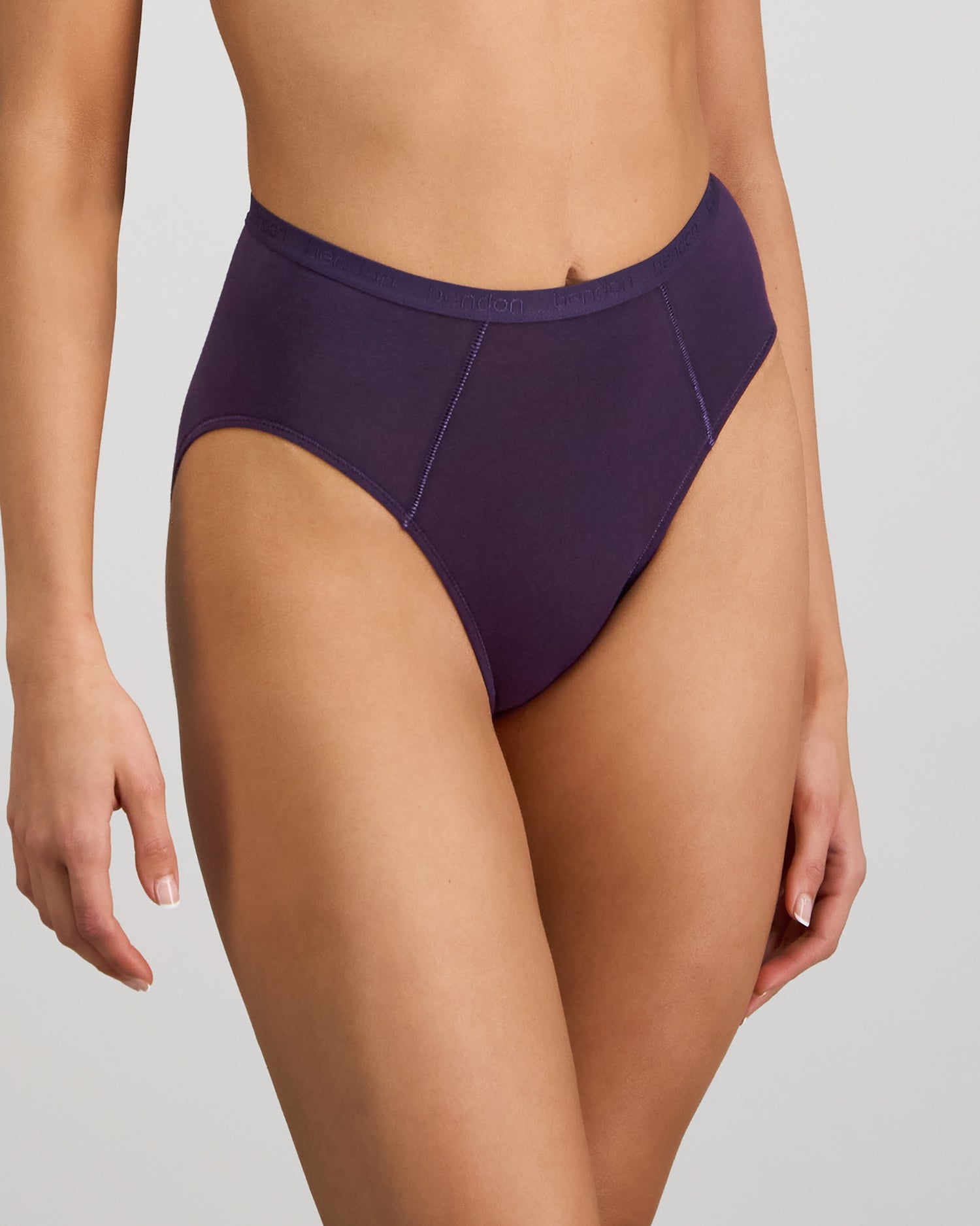 Model wears Body Cotton High Cut Brief in PURPLE VELVET. On body side view
