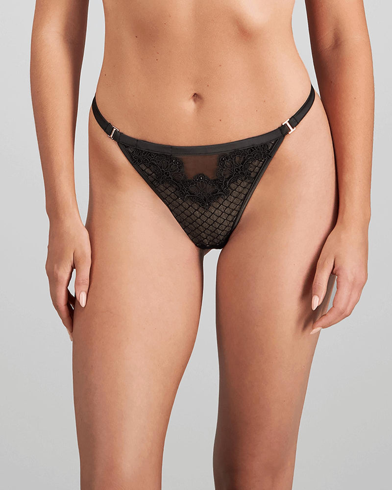 Model wears Bianca Nera Thong in BLACK. On body front view