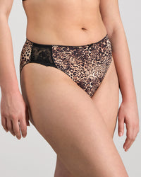 Model wears Violet Floral High Cut Brief in MYTHOS ANIMAL PRINT. On body side view