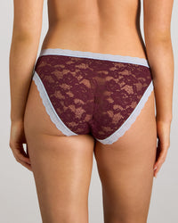 Model wears Leo Bikini in FIG/SKYWAY. On body back view