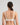 Model wears Simply Seamless Wire Free Bra in Basic Wht. On body back view