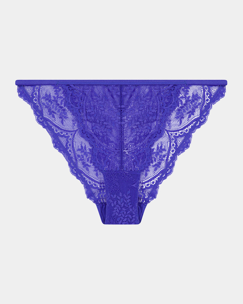 Midnight Muse Tanga in DAZZLING BLUE. Flat lay front view