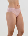 Model wears Lacey Brazilian in SILVER PINK. On body side view