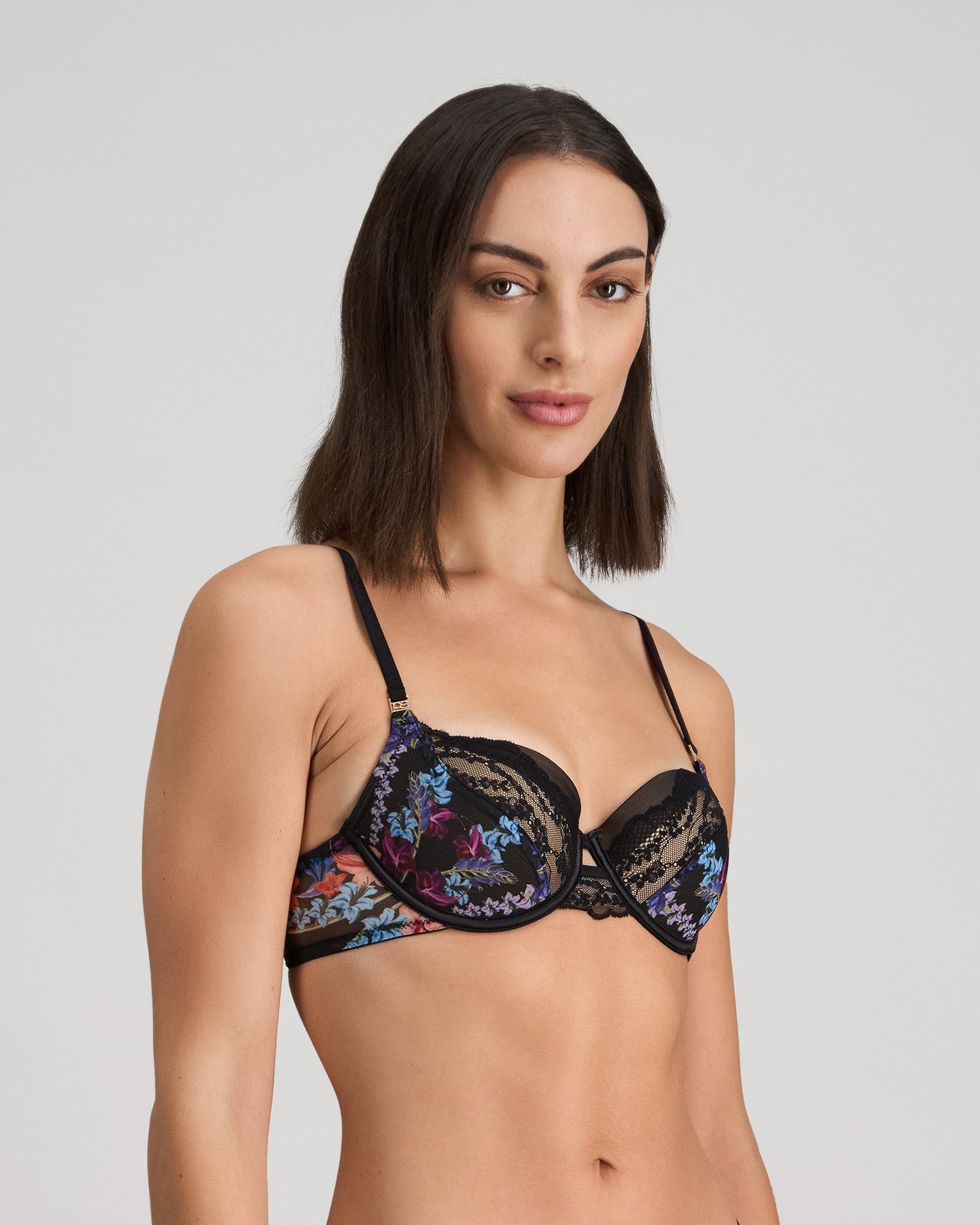 Model wears Adaline Contour Bra in BLACK FLORAL PRINT. On body side view