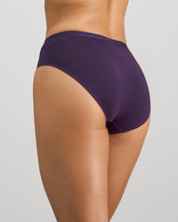 Model wears Body Cotton Bikini in PURPLE VELVET. On body side view