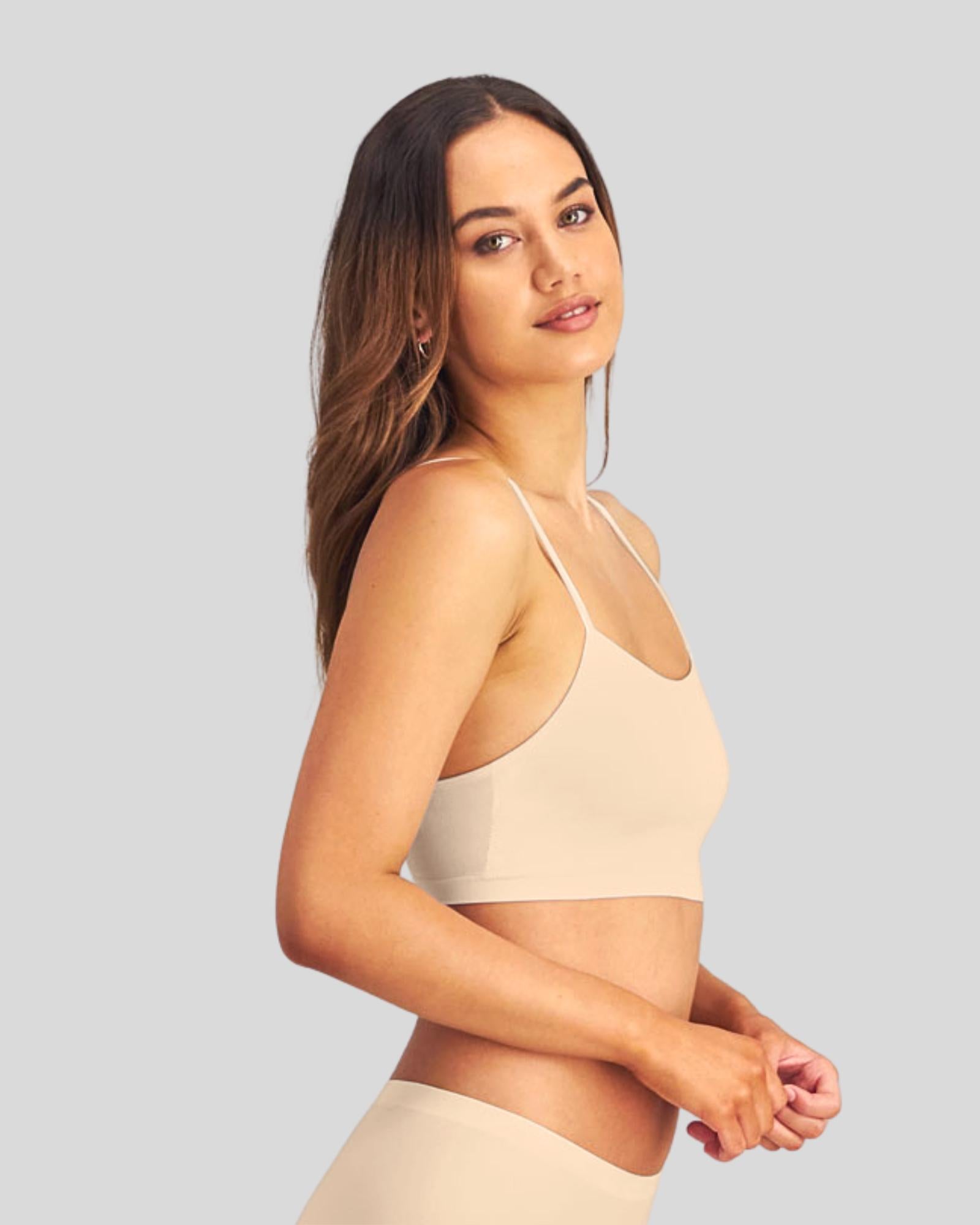 Model wears Simply Seamless Crop Top in Nude. On body front view