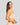 Model wears Simply Seamless Crop Top in Nude. On body front view
