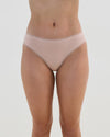 Model wears Stretch Cotton Bikini in LATTE. On body front view