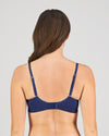 Model wears Bendon Body Lace Contour Bra in Medieval Blue. On body back view