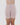 Model wears Smoothing Bodywear Chafer Short in CARAMEL. On body front view