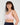 Model wears Power Underwire Bra in LATTE. On body front view