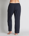 Model wears Sleep-Talk Long PJ Pant in NIGHT SKY. On body back view