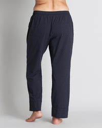 Model wears Sleep-Talk Long PJ Pant in NIGHT SKY. On body back view