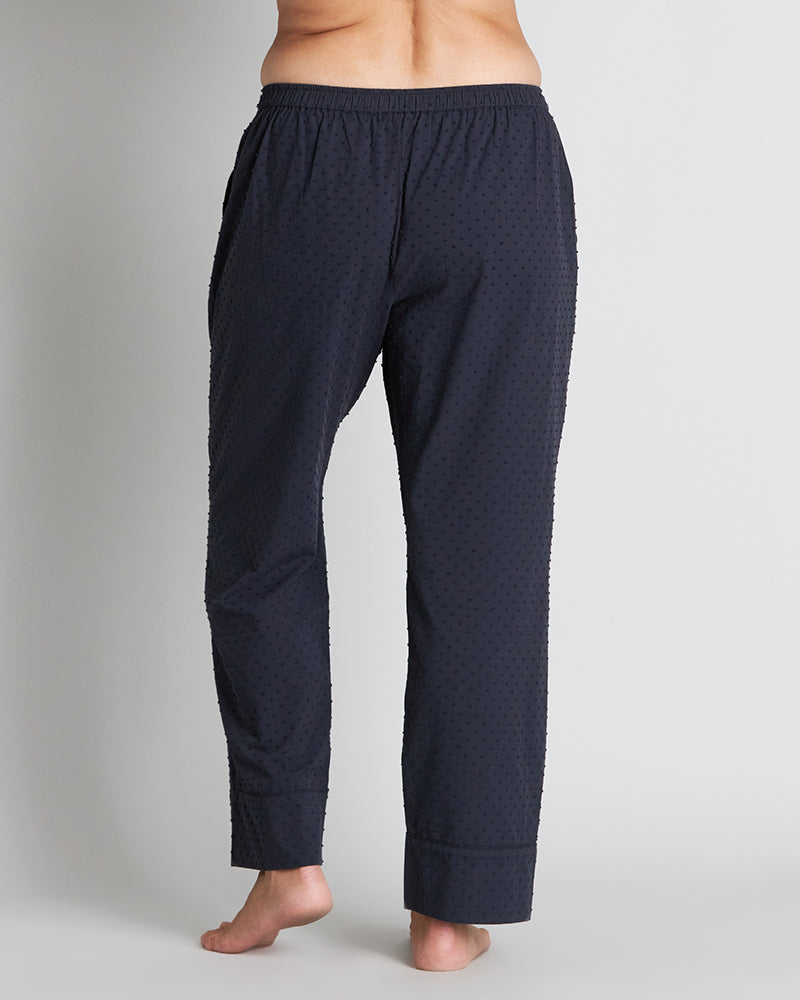 Model wears Sleep-Talk Long PJ Pant in NIGHT SKY. On body back view
