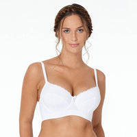 Model wears Castaspell Contour Long Line Bra in WHITE. On body front view